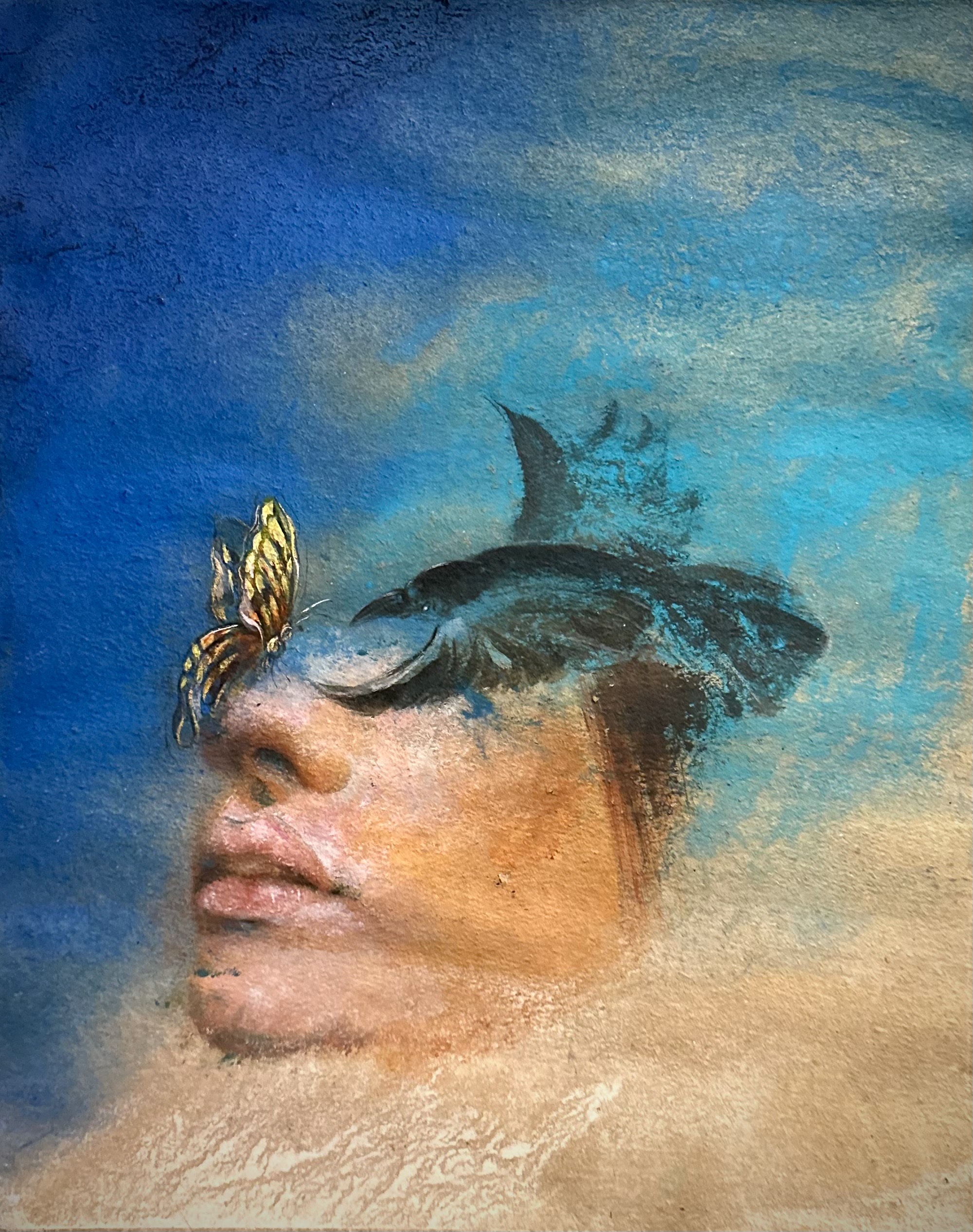 Detail of Hasura Akther Rumky painting showing a face with textured natural pigments in blue and earth tones, with a butterfly resting on the forehead